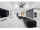 Bright living room with high ceilings, sleek furniture, and a modern design at 5264 Prestley Crossing Ln, Douglasville, GA 30135