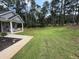 Large backyard with covered porch at 190 Paul Aiken Rd, Dallas, GA 30157