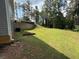 Expansive backyard featuring a well-maintained lawn and garden area at 190 Paul Aiken Rd, Dallas, GA 30157
