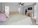 Bedroom featuring a large bed, ensuite bathroom, walk-in closet, and natural light at 190 Paul Aiken Rd, Dallas, GA 30157