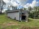 Exterior of house featuring multiple windows, wooden deck and stairs at 190 Paul Aiken Rd, Dallas, GA 30157