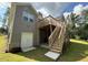 Exterior rear of home featuring multiple windows, wooden deck and stairs at 190 Paul Aiken Rd, Dallas, GA 30157