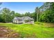 Charming single-story home featuring a large, well-manicured front lawn and a welcoming front porch at 190 Paul Aiken Rd, Dallas, GA 30157