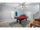 Spacious game room featuring a pool table, bar, and ceiling fan at 190 Paul Aiken Rd, Dallas, GA 30157