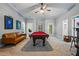 Large recreation room with pool table and leather sofa; great for entertaining and Gathering time at 190 Paul Aiken Rd, Dallas, GA 30157
