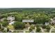 Community view featuring a home close to the pool and tennis courts, nestled in a wooded neighborhood at 1925 Waters Ferry Dr, Lawrenceville, GA 30043