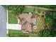 Overhead view showcasing a well-maintained home with a spacious backyard and fire pit at 1925 Waters Ferry Dr, Lawrenceville, GA 30043