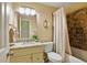 This nice bathroom offers a vanity with a sink, a toilet, and a shower-bathtub combination at 1925 Waters Ferry Dr, Lawrenceville, GA 30043