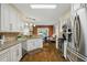 Well-equipped kitchen features stainless steel appliances, granite countertops, and plenty of cabinet space at 1925 Waters Ferry Dr, Lawrenceville, GA 30043