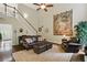 Spacious living room with hardwood floors, high ceilings, and a decorative tapestry at 1925 Waters Ferry Dr, Lawrenceville, GA 30043