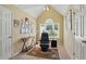 Office features a comfortable chair with a console and a carpet flooring at 1925 Waters Ferry Dr, Lawrenceville, GA 30043