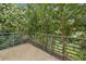 Relaxing balcony overlooking a serene, green landscape, perfect for enjoying nature at 195 Arizona Ne Ave # 197, Atlanta, GA 30307