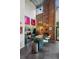 Modern kitchen features stainless steel appliances, exposed brick, and breakfast bar seating at 195 Arizona Ne Ave # 197, Atlanta, GA 30307