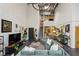 Bright living room with high ceilings, unique light fixture, and an abundance of art at 195 Arizona Ne Ave # 197, Atlanta, GA 30307