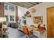 Open living space with industrial ceiling, and art desk, filled with natural light, and space to create at 195 Arizona Ne Ave # 197, Atlanta, GA 30307