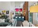 Bright living space with modern kitchen, comfortable sofa, and dining table by window at 195 Arizona Ne Ave # 197, Atlanta, GA 30307