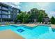 Inviting community pool with lounge chairs and manicured landscaping, perfect for relaxation at 195 Arizona Ne Ave # 197, Atlanta, GA 30307
