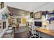 Bright studio with industrial ceiling, white walls, wood floors, and an abundance of natural light from large windows at 195 Arizona Ne Ave # 197, Atlanta, GA 30307