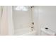Bright bathroom with a white tiled shower and classic fixtures at 202 Garden Ct, Atlanta, GA 30328