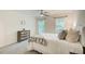 Inviting bedroom with a ceiling fan, large windows, and a cozy feel at 202 Garden Ct, Atlanta, GA 30328