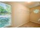 Walk-in closet with a window and built in shelf storage for organization at 202 Garden Ct, Atlanta, GA 30328