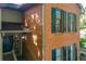 Inviting brick home featuring dark shutters and a covered porch entrance for a charming curb appeal at 202 Garden Ct, Atlanta, GA 30328