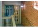 Well-maintained front entrance with a stylish door and decorative exterior lighting at 202 Garden Ct, Atlanta, GA 30328