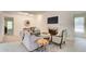 Spacious living room with fireplace, comfortable seating, and modern decor at 202 Garden Ct, Atlanta, GA 30328