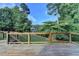 Back deck with railings overlooking the yard with trees at 306 Mill Rdg, Canton, GA 30114