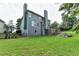Charming home featuring a spacious backyard and a wooden fence, perfect for outdoor activities at 306 Mill Rdg, Canton, GA 30114