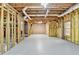 Unfinished basement with wood framing and insulated walls at 306 Mill Rdg, Canton, GA 30114