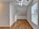 Bedroom with hardwood floors, neutral walls and vaulted ceiling offering lots of natural light at 306 Mill Rdg, Canton, GA 30114