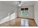 Bedroom with hardwood floors, natural light, and neutral tones that create a serene atmosphere at 306 Mill Rdg, Canton, GA 30114