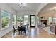 Cozy breakfast nook features hardwood floors, natural light, and serene outdoor views at 306 Mill Rdg, Canton, GA 30114