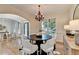 Open-concept dining area with access to the entry and natural light at 306 Mill Rdg, Canton, GA 30114