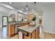 Open kitchen featuring granite countertops, stainless steel appliances, and breakfast bar at 306 Mill Rdg, Canton, GA 30114