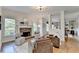 Inviting living room featuring a stone fireplace and comfortable seating arrangement at 306 Mill Rdg, Canton, GA 30114