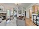 Bright living room with stone fireplace, hardwood floors, and an open layout at 306 Mill Rdg, Canton, GA 30114