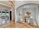 Open-concept living room with hardwood floors and staircase access at 306 Mill Rdg, Canton, GA 30114