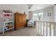 Bedroom view showing crib and furnishings at 1612 Silver Oak Dr, Austell, GA 30106