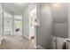 Hallway leading to bedrooms, with stairway access at 1612 Silver Oak Dr, Austell, GA 30106