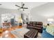 Spacious living room with hardwood floors offering seamless transition to dining and kitchen at 1612 Silver Oak Dr, Austell, GA 30106
