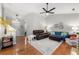 Inviting living room showcases hardwood floors, comfortable seating, and ample natural light at 1612 Silver Oak Dr, Austell, GA 30106