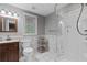 Bright bathroom with shower, marble floors and window at 3525 Stone Cliff Way, Woodstock, GA 30189