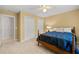 Bedroom with ceiling fan and plush carpet; the room has great natural light at 3525 Stone Cliff Way, Woodstock, GA 30189