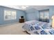 Comfortable bedroom with natural light, carpet flooring, and a relaxing ambiance at 3525 Stone Cliff Way, Woodstock, GA 30189