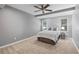 Spacious bedroom features neutral paint, ceiling fan, and plush carpet at 3525 Stone Cliff Way, Woodstock, GA 30189