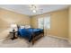 Bedroom with a ceiling fan, natural light from the windows, and neutral carpet at 3525 Stone Cliff Way, Woodstock, GA 30189