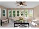 Bright sunroom filled with natural light, perfect for relaxation or entertaining guests at 3525 Stone Cliff Way, Woodstock, GA 30189