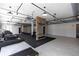 Bright fitness center featuring modern equipment, mirrors, and stylish industrial lighting at 4231 Millcroft Pl # 207, Buford, GA 30518